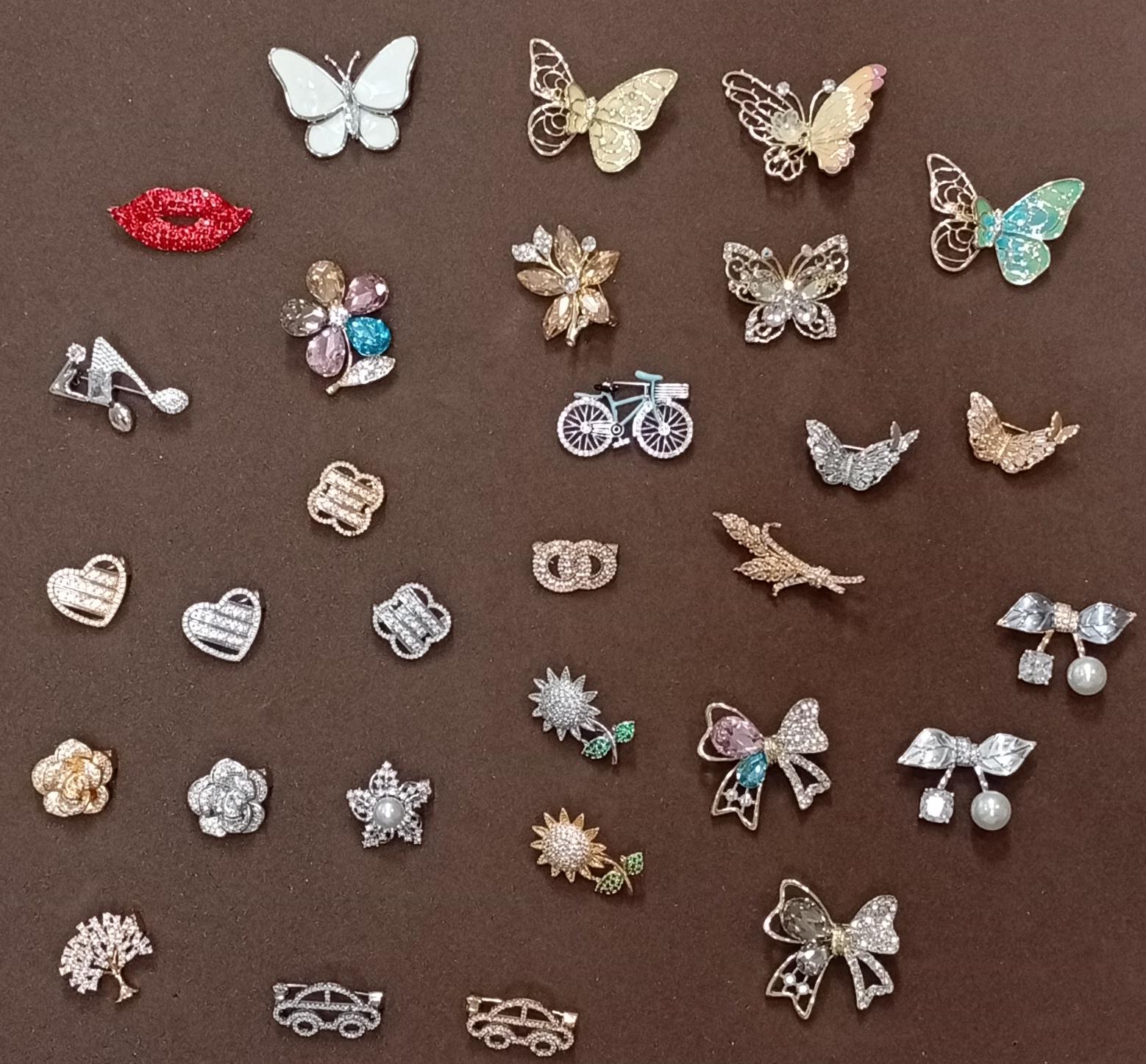 Broches Alfinete